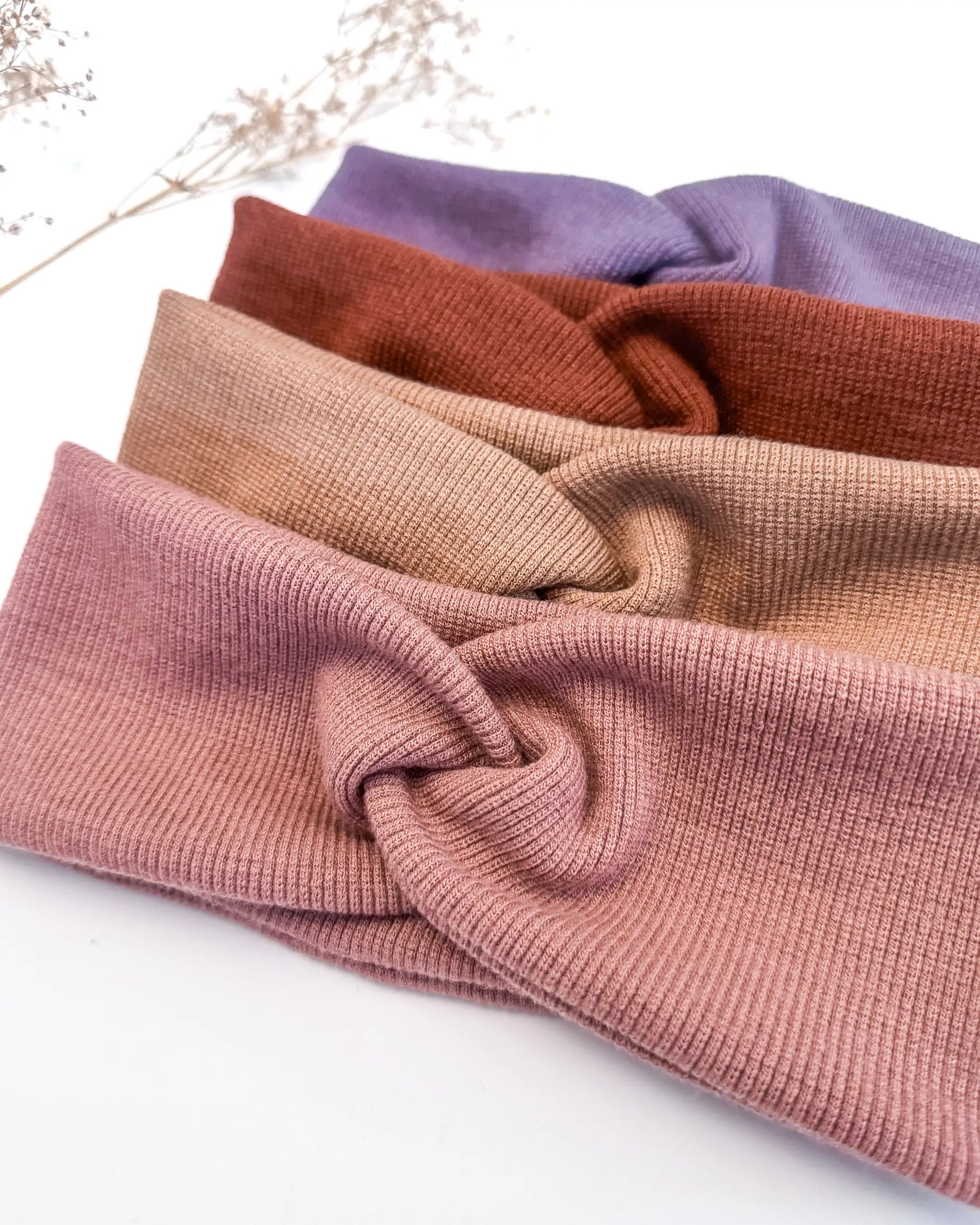 Stirnband aus Bio-Merinowolle für Babys,Kinder und Damen, weich und temperaturausgleichend, ideal für kühle Tage im Herbst, Winter und Frühling.