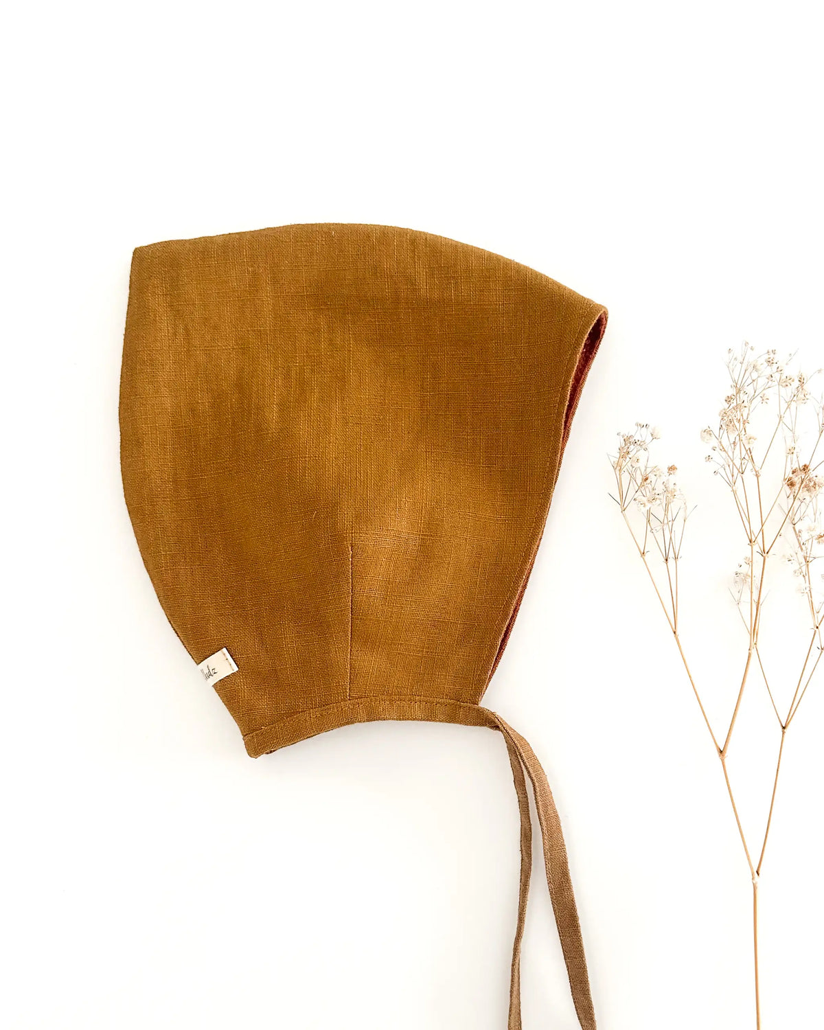 Pixiemütze aus Leinen für Babys und Kinder, leichte Zwergenmütze mit Zipfel und Bindebändern, atmungsaktive Sommermütze schützt Kopf vor Sonne und Wind.
Ideal als Jungen Babyhaube für Frühling und Sommer und eine bequeme kopfbedeckung mit einzigartigem Look.