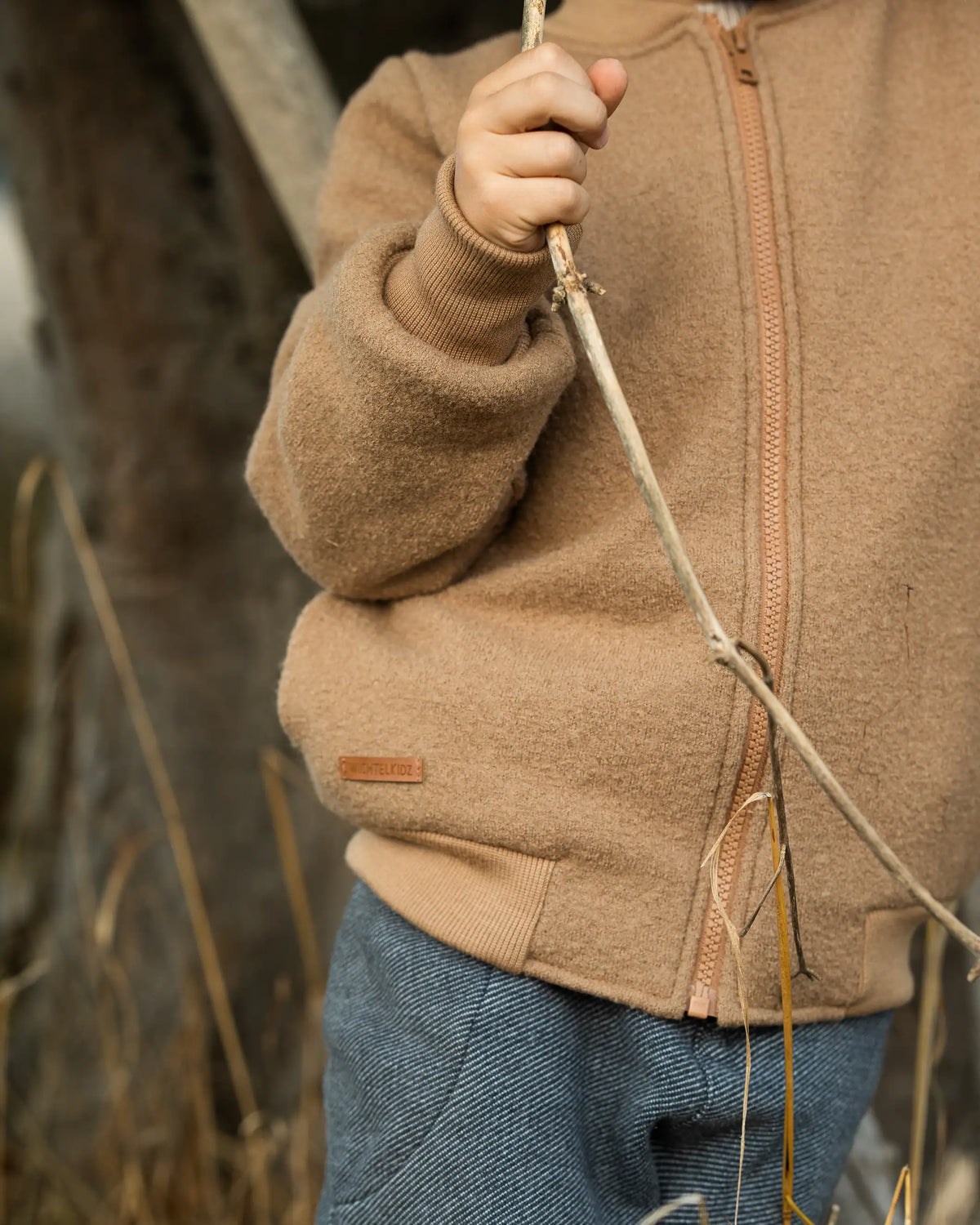 Detailaufnahme Kinder Collegejacke aus Wollwalk mit Taschen und Reißverschluss Camel