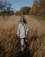 Wollwalk Schlupfmütze für Kinder aus 100 % Schurwolle mit weichem Jerseyfutter, ideal für Winter, Kindergarten und Spaziergänge.