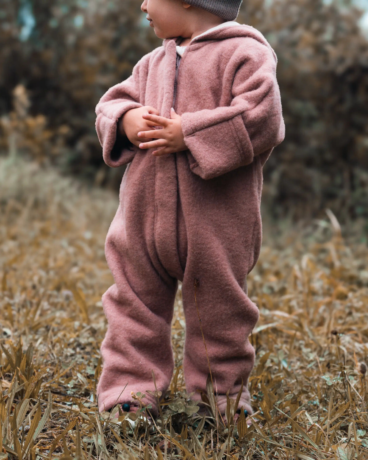 Wollfleece Overall aus merino wolle für Kinder und babys. mit praktischen umschlagbündchen als handschuh ersatz