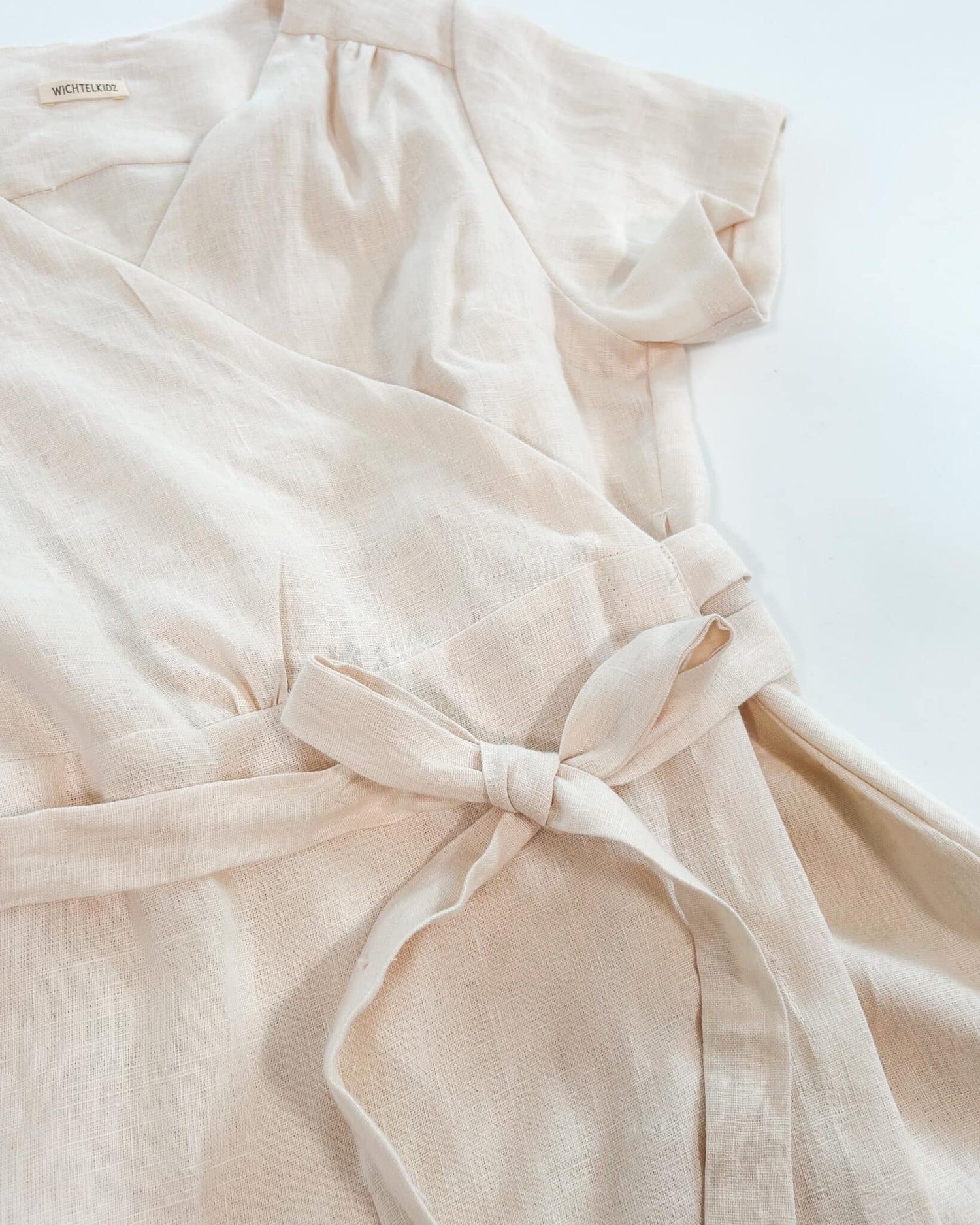 Sofortkauf: knielanges Damen Wickelkleid aus Leinen in Wollweiß, Gr. L (42/44)