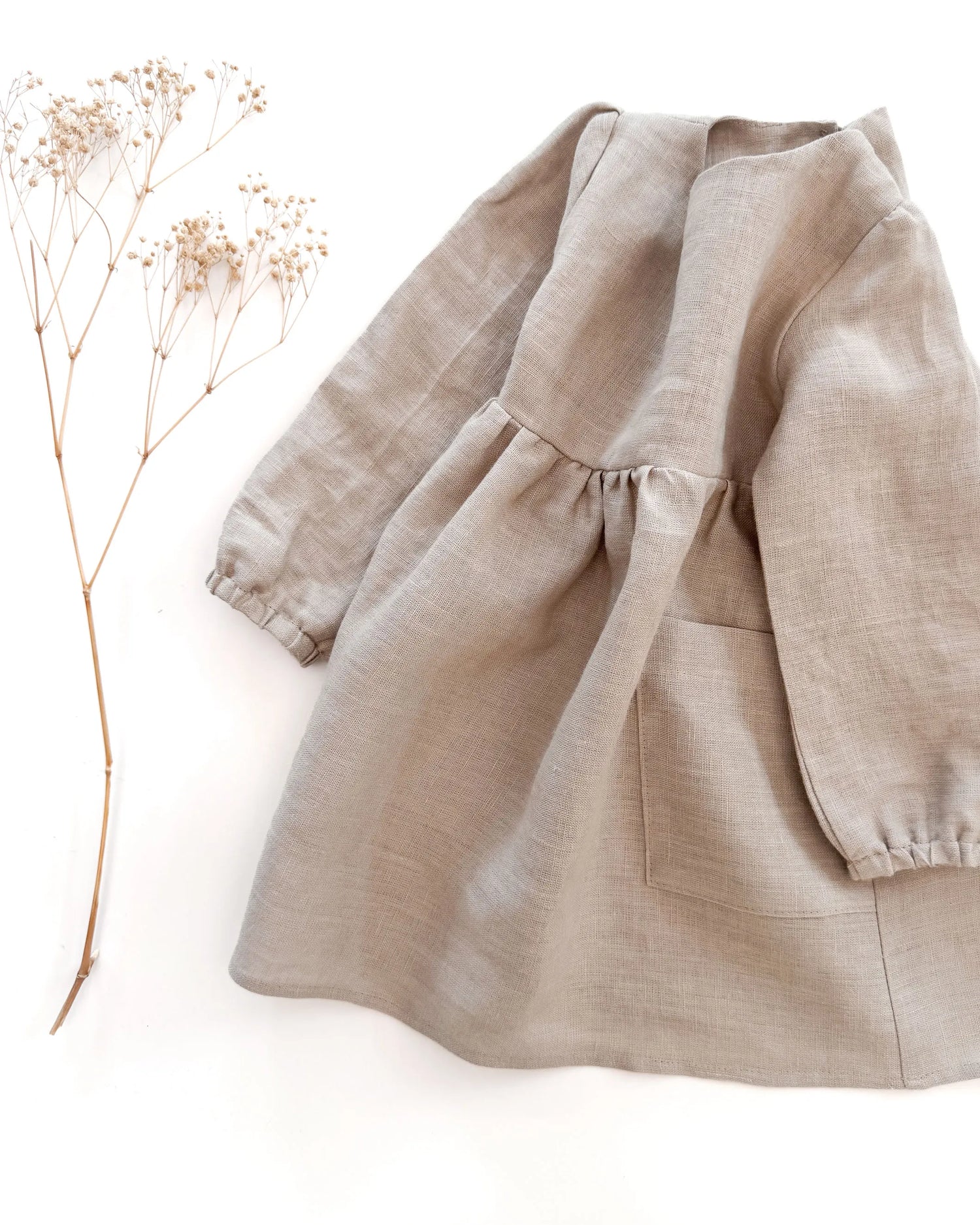 Sofortkauf: Leinenkleid langarm mit Taschen in Sand, Gr. 98/104