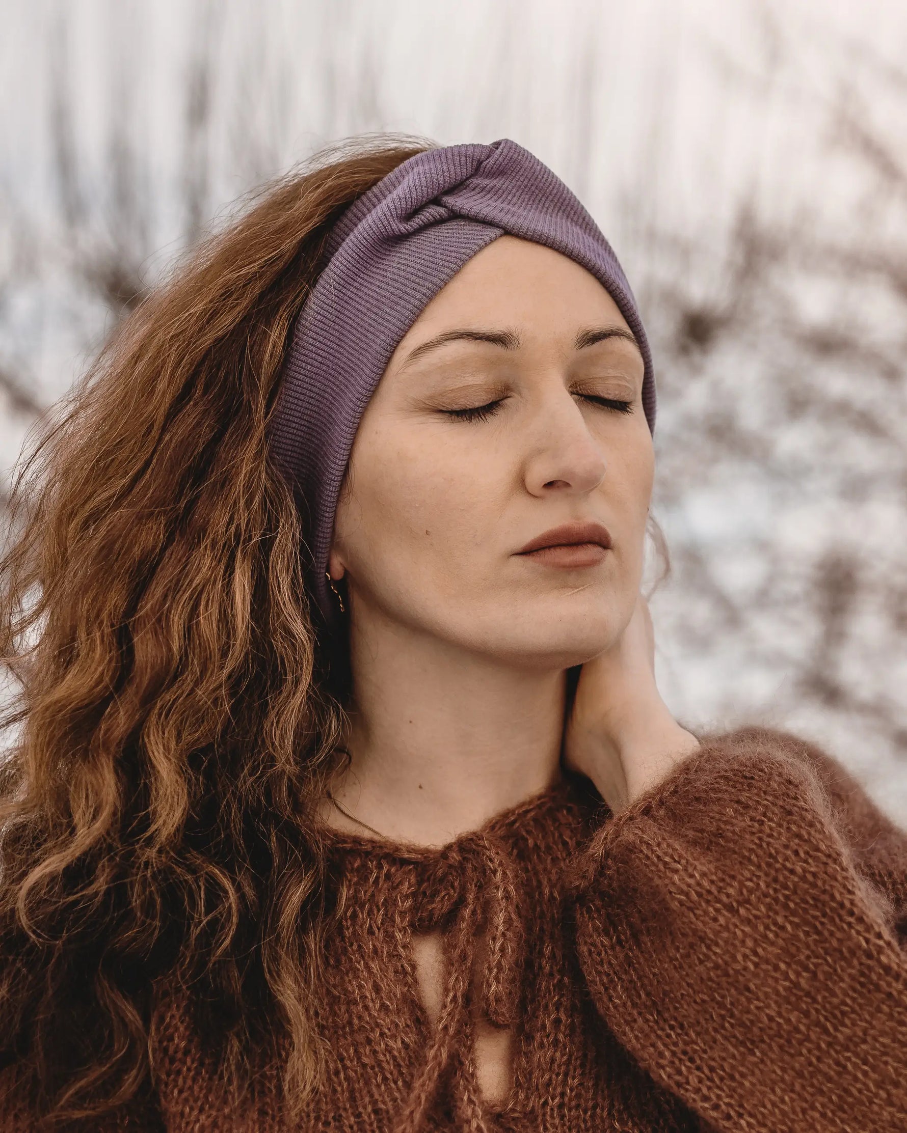 Damen Stirnband aus Bio-Merinowolle, weich und temperaturausgleichend, ideal für Herbst und Winter, schützt die Ohren vor Wind und Kälte.