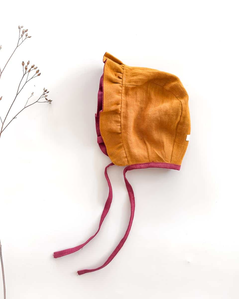 Sofortkauf: Leinen Baby Bonnet in Himbeere/Senf, Gr. 44-46