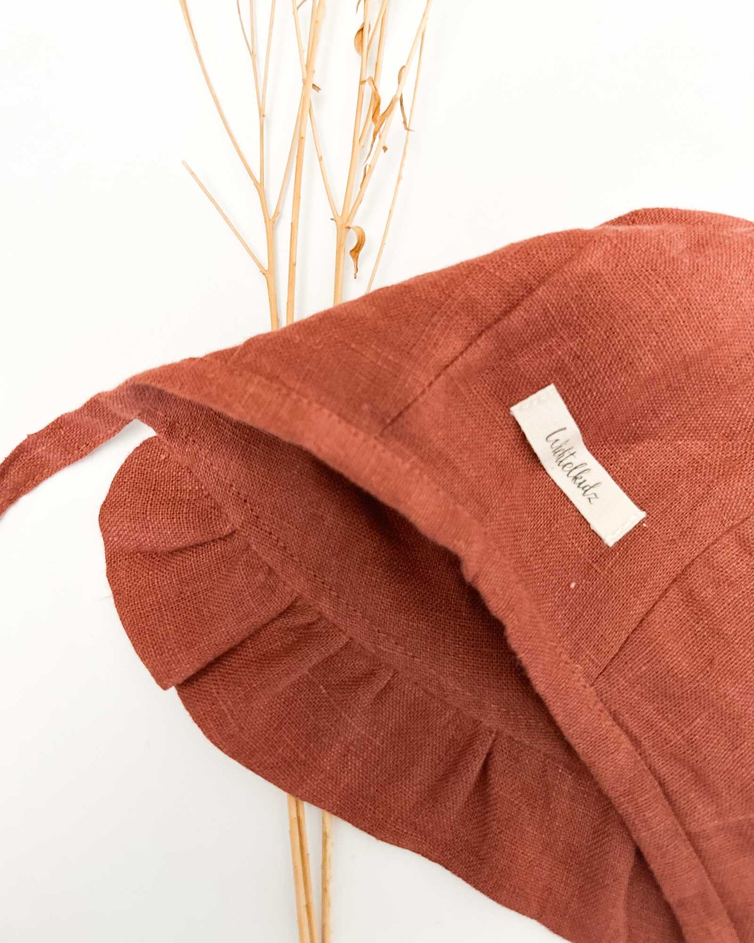 Sofortkauf: Leinen Baby Bonnet in Rost, Gr. 36-38