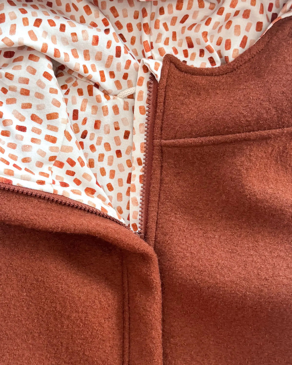Sofortkauf: Wollwalk Jacke mit Reißverschluss in Rost/Herbstkonfetti, Gr. 116/122